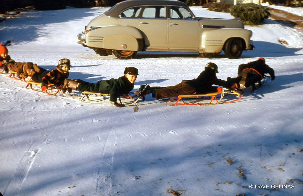 1941 Cadillac in a winter sledding scene, 1941