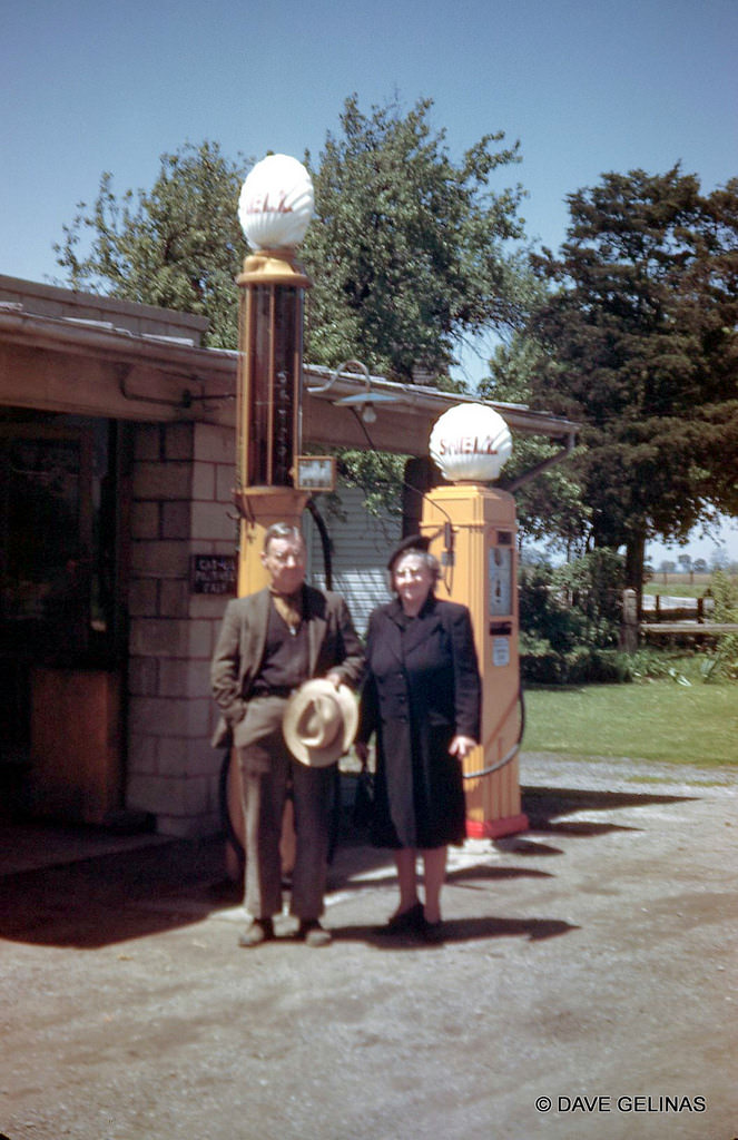 Shell Gas Station with visible gas pump and gas globes, 1940s