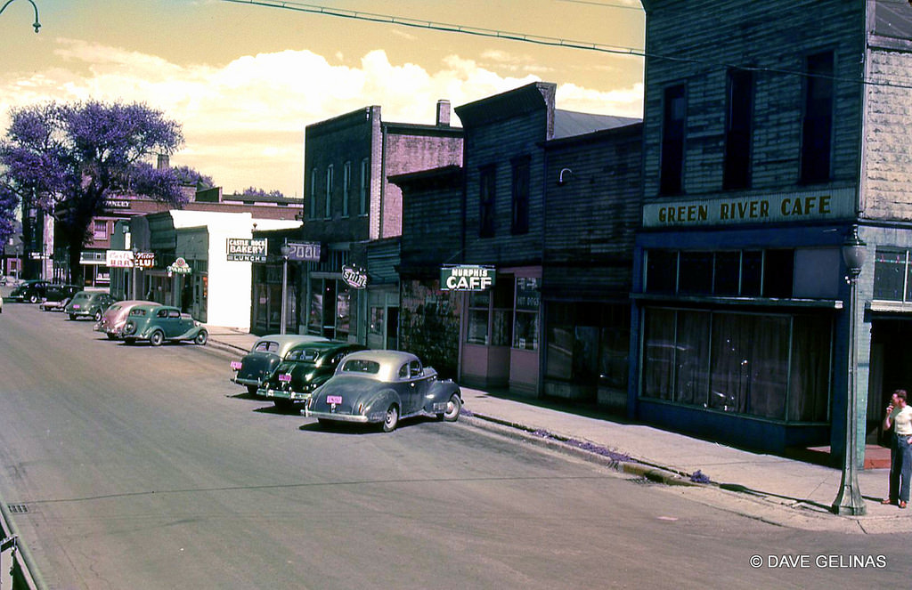 Street Scene with vintage autos and signs, Green River, Wyoming, 1940s