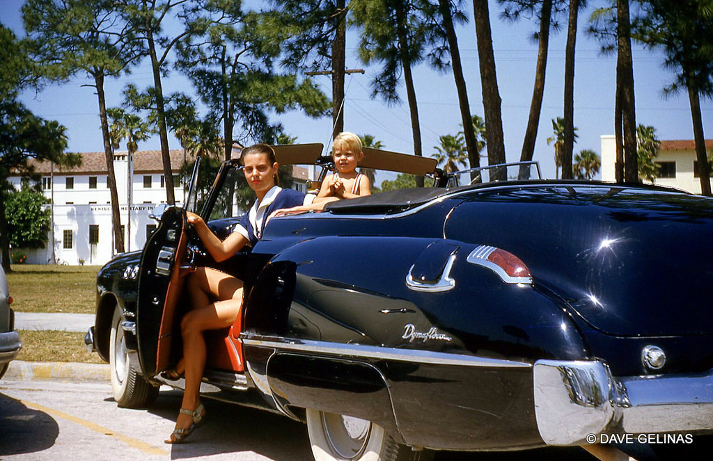 1949 Buick with a mother and son, 1950s