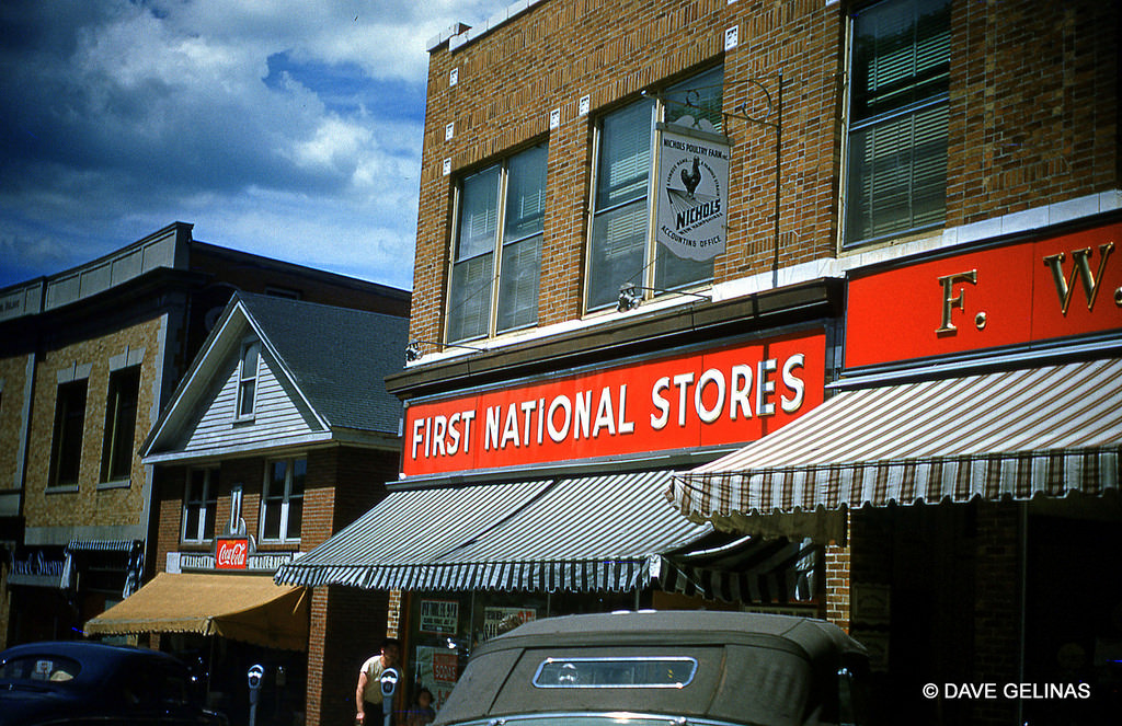 First National Store on Main Street with a Coca Cola Sign and vintage autos, Exeter, New Hampshire, 1949