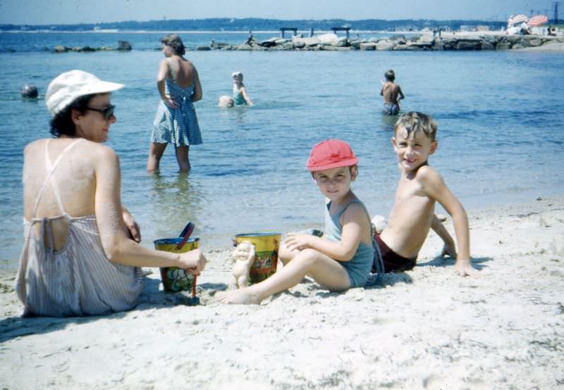Mother and children at the beach