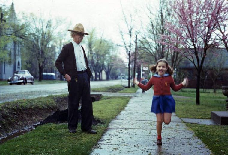 Proud grandpa watches solo rope skip, New Harmony, Indiana, 1941