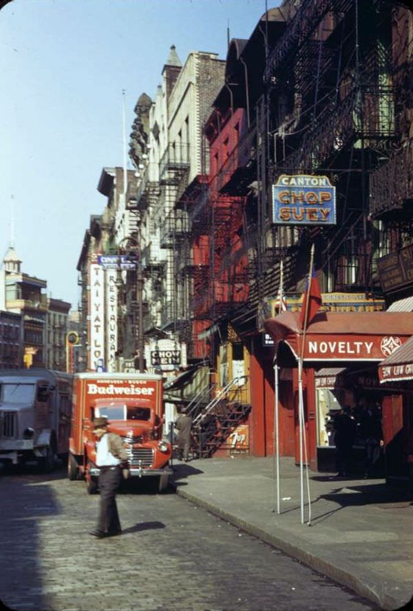 A street in New York's Chinatown, Sidewalk along Chinese store fronts, New York City, 1942