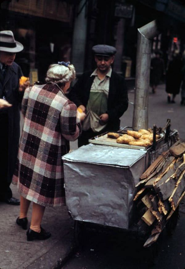 Hot sweet potatoes on Sidewalk store, New York City, 1942