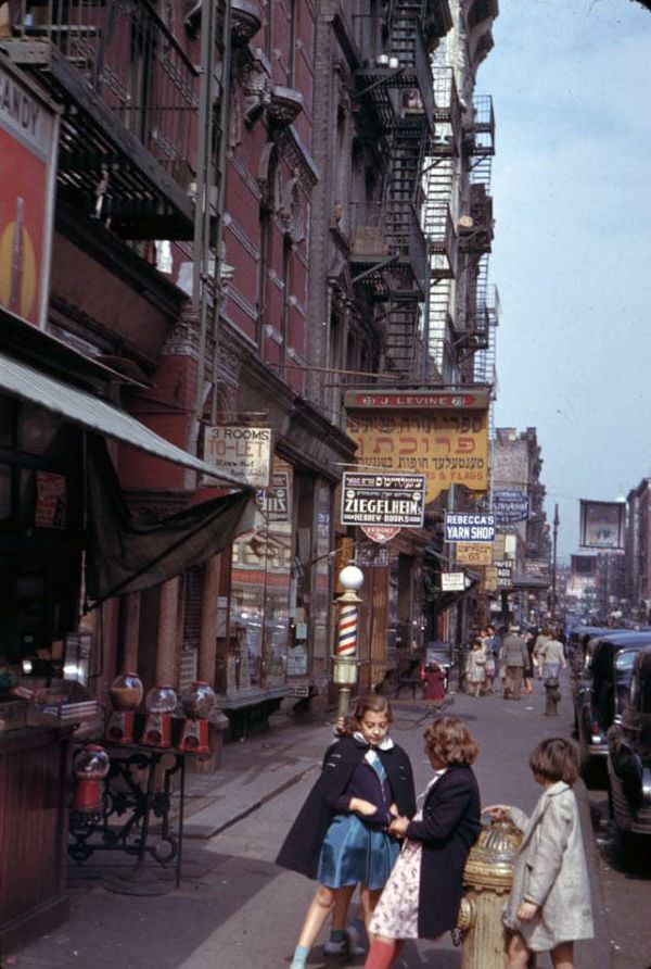 Two views looking up a street of many races, lower Manhattan, New York City, 1942