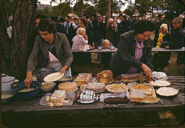 Cutting the pies and cakes at the barbeque dinner, Pie Town, New Mexico Fair, 1940