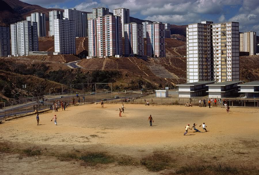 Youth playing baseball in a city sandlot in Caracas, Venezuela, 1976
