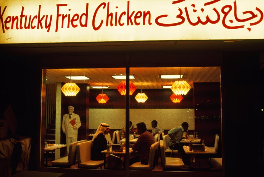 Abu Dhabian men patronizing an American restaurant chain, 1975