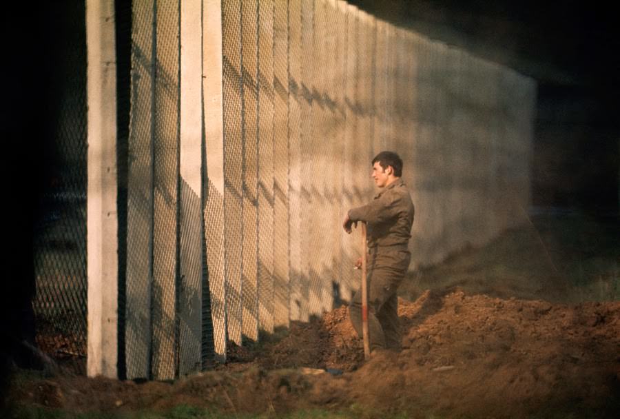 East German man standing near the Berlin Wall, 1974