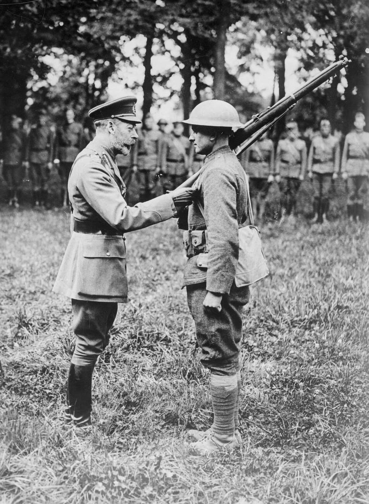 King George V giving a medal to an American soldier in France, 1918