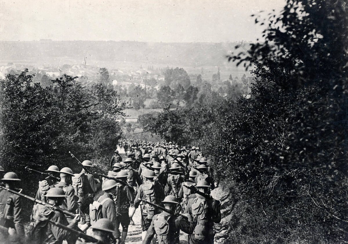 American soldiers marching into a French town, 1918