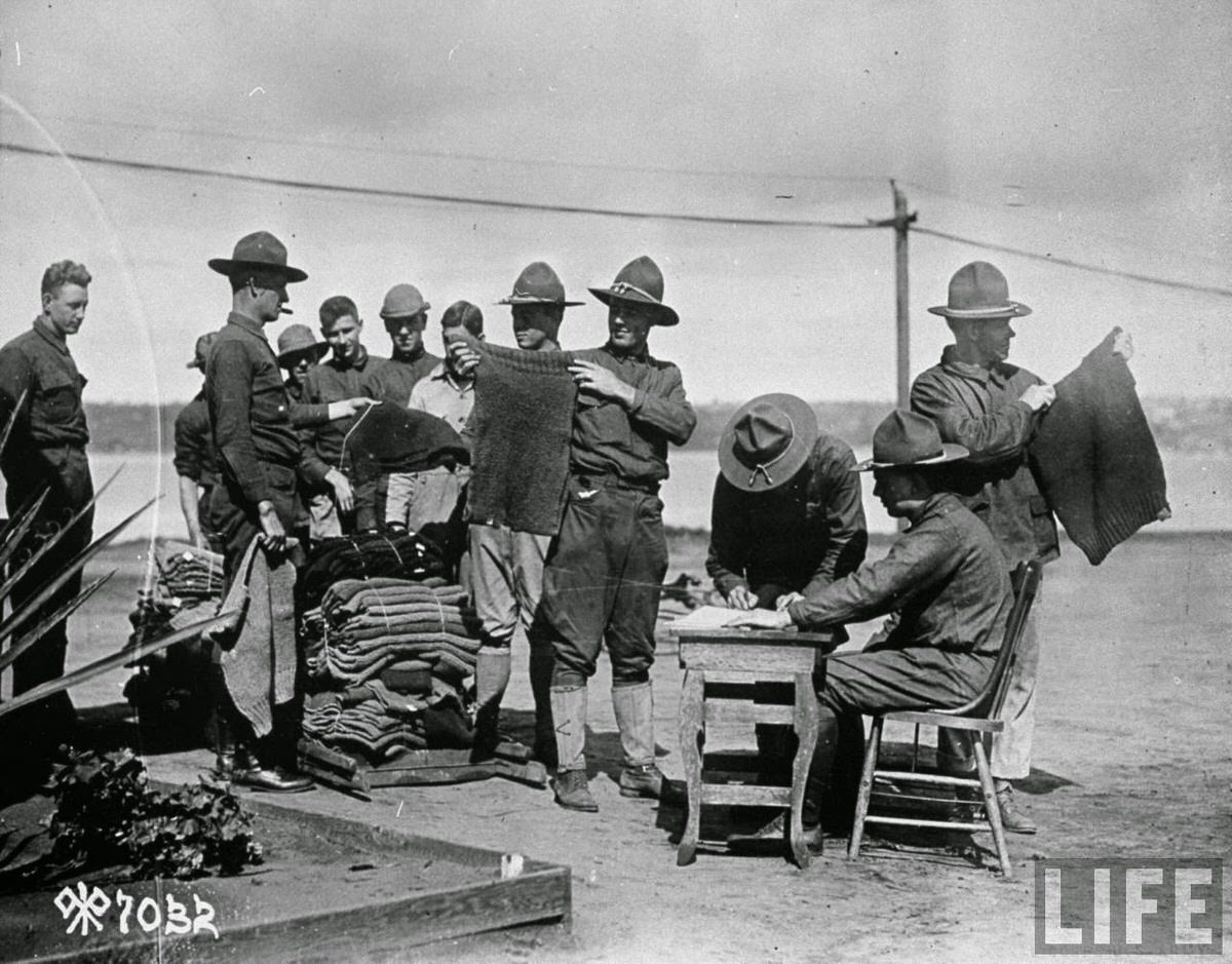American soldiers lining up to get new clothing from the quartermaster during World War I.