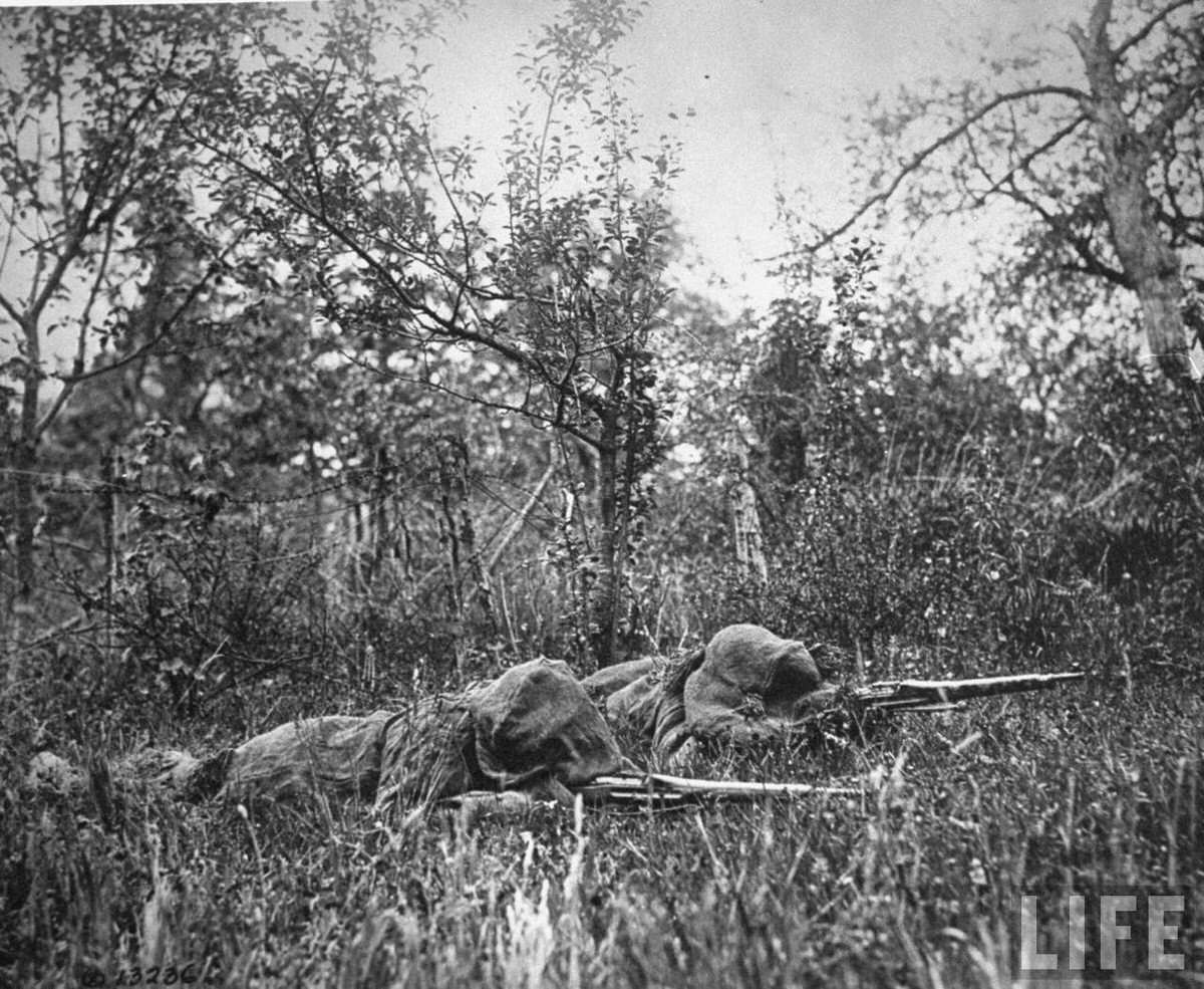 Camouflaged American snipers during World War I.