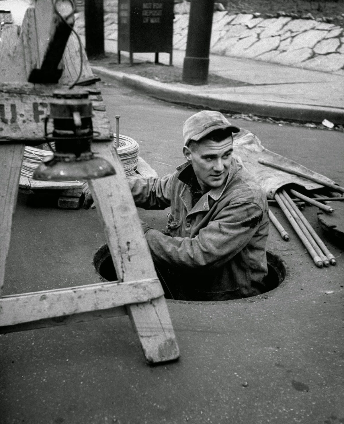 Jack Krueger working as a utility worker, 1954