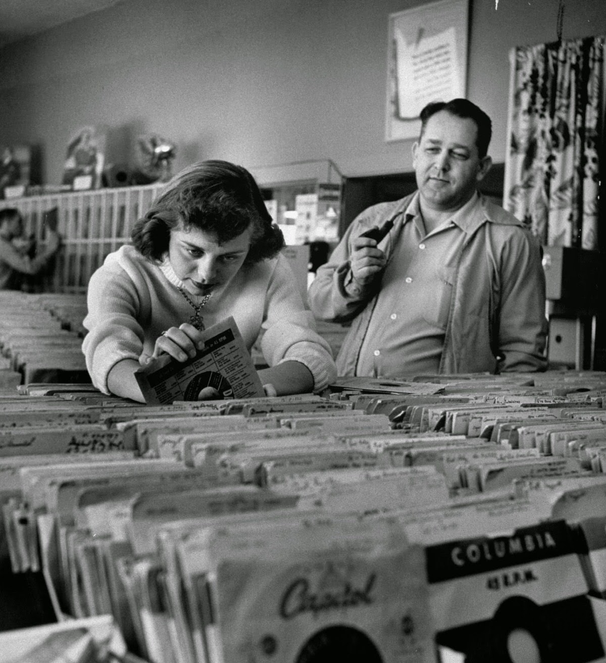 Margaret High working in a music store, 1954