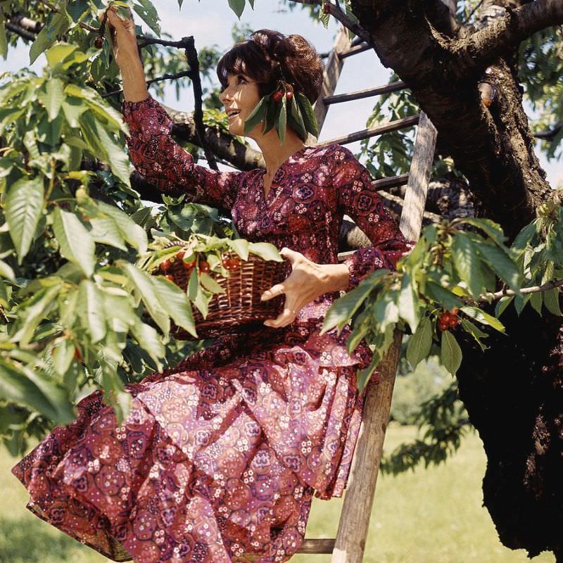 Audrey Hepburn in her orchard at La Paisible, her house in Switzerland, 1971