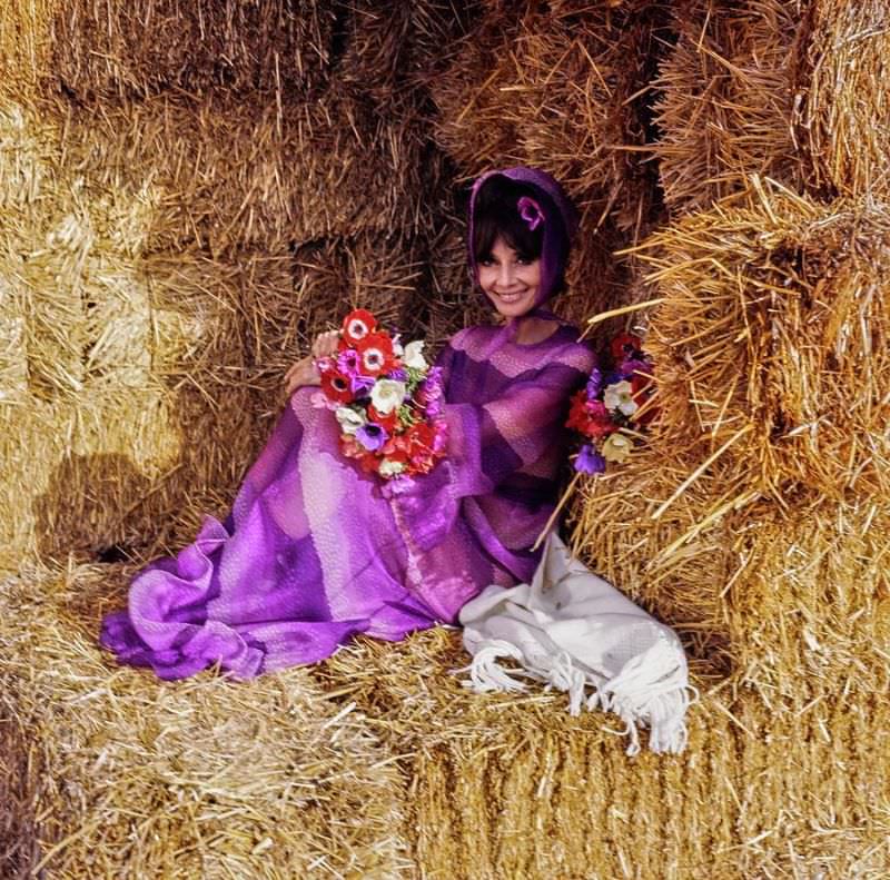 Audrey Hepburn wearing a purple Givenchy dress for Vogue, 1971