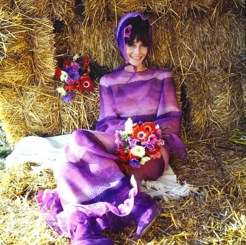 Audrey Hepburn wearing a purple Givenchy dress for Vogue, 1971