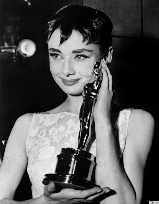 Your bangs don’t always have to be worn straight across your forehead. Hepburn played around with her’s for an edgy, asymmetrical, cut-up look.