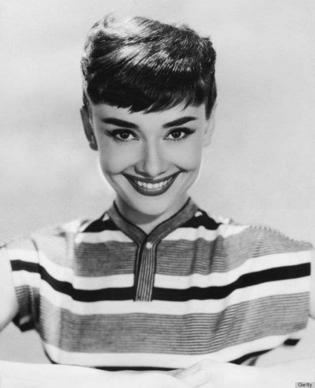 Striped t-shirts and cropped haircuts can still look super feminine. Hepburn’s confidence made this boyish look shine.