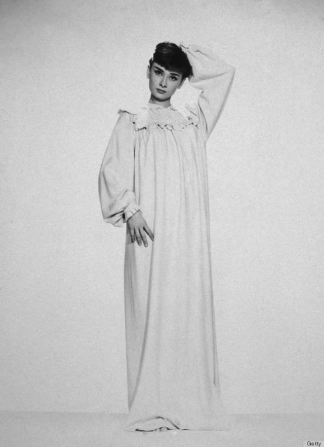 Wearing a cozy nightgown is completely acceptable. You don’t always have to wear skimpy things to bed — comfort takes precedence!