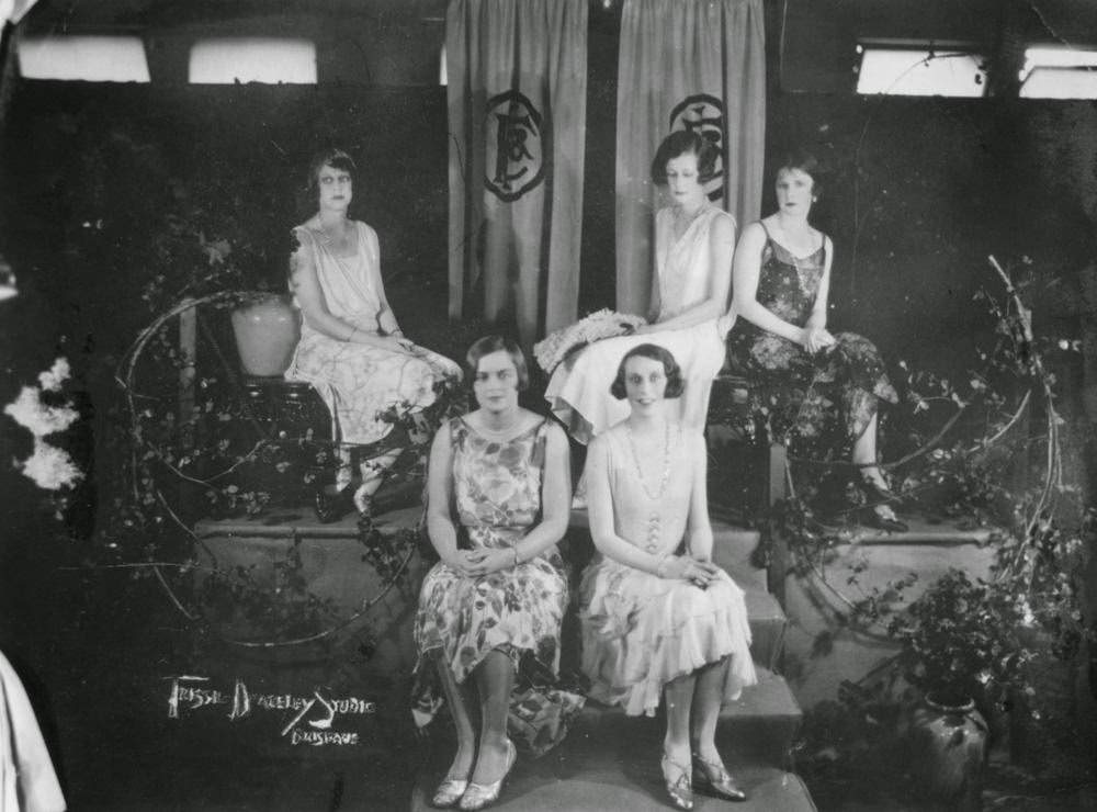 Models at a fashion parade at Finney Isles & Co. wearing 1920s evening dresses, 1929