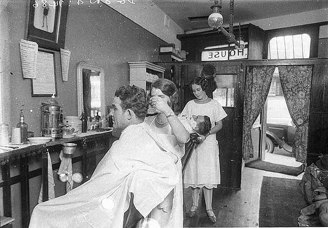Two of the first female men's barbers, Miss Dolly House and her sister, c.1927. The House sisters’ father, Jack House, ran the barber shop just underneath Australasian Films' film studio.