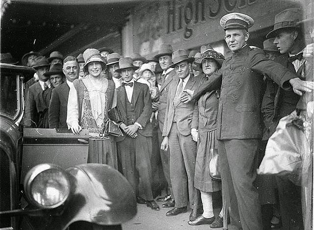 First "Miss Australia", Beryl Mills of WA, 1927. Theatre commissionaire holds back crowd from the first "Miss Australia", Beryl Mills of Western Australia, outside Sydney’s Haymarket Theatre, 14 December 1927.