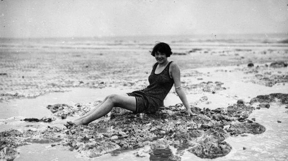 Vacationer sitting on a New Jersey beach, 1929
