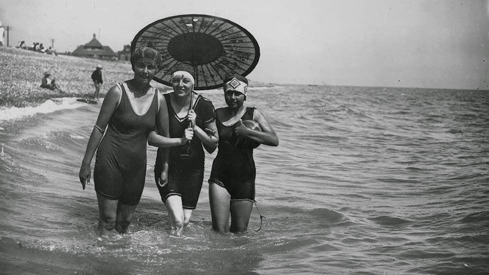 Keeping cool in the sea during a heatwave at Bexhill, Kent, 1928