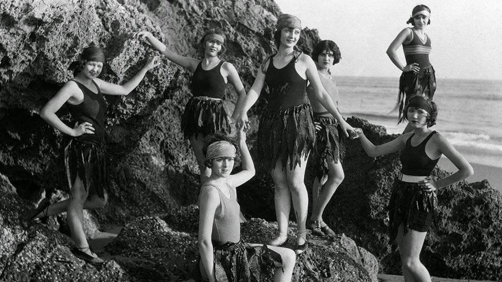 Women posing near a Paris beach, 1925