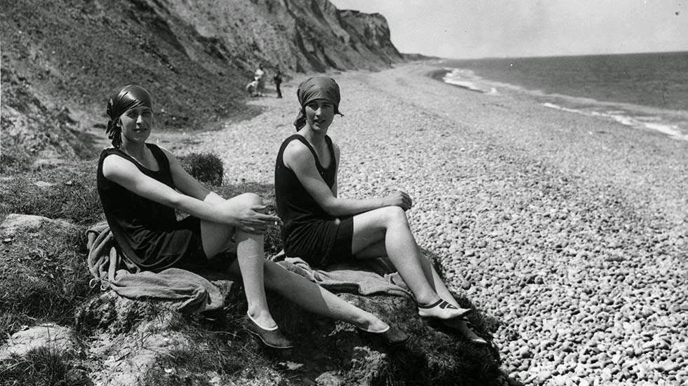 Two young women sunbathing on the beach at Sheringham in Norfolk, 1926