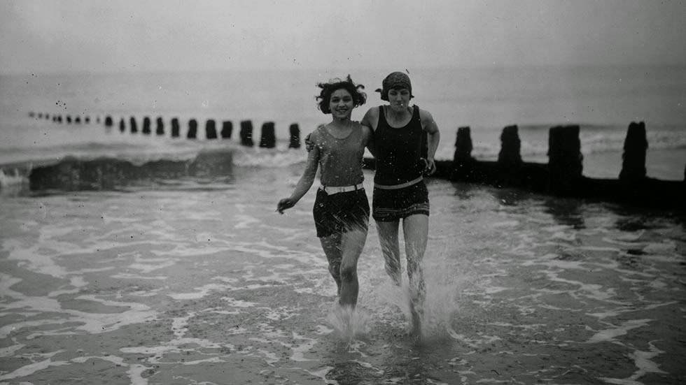 Two girl bathers enjoying an early morning dip at Bognor, 1929