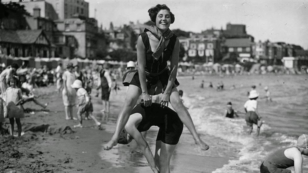 Two women playing leapfrog on the beach at Broadstairs in Kent, 1927