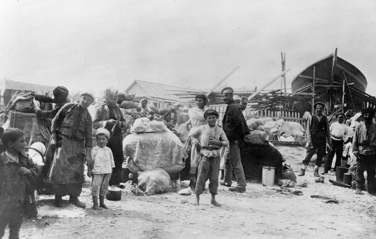 Armenian refugees with household possessions on a Black Sea beach in Novorossiysk, Russia, 1920
