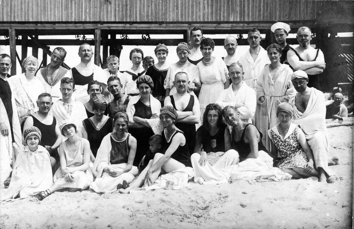 Group of people posing on the beach of Dziwnów on the Baltic Sea, 1921