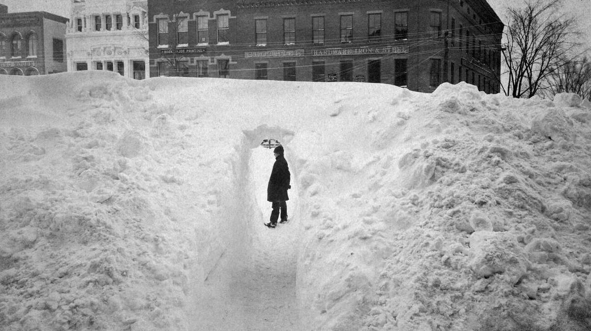 Tunnel cut through snow drifts on Main Street after the blizzard of 1888 in Northampton, Massachusetts, 1888