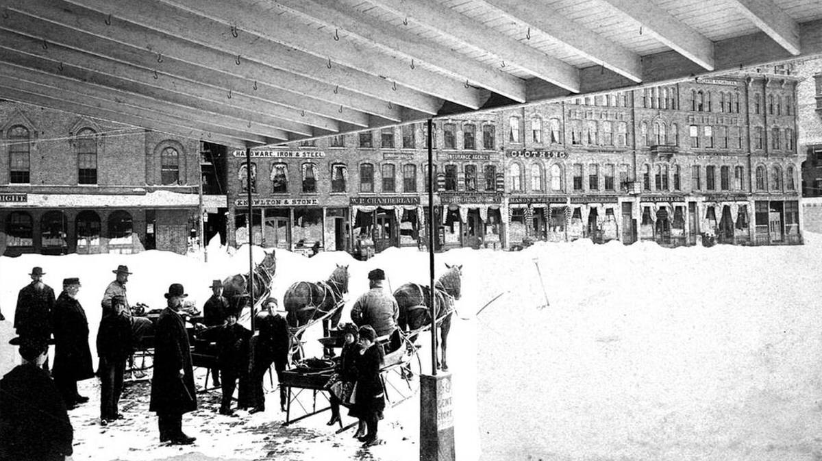 Wilbur's Market teams in Keene, New Hampshire after the blizzard of March, 1888.