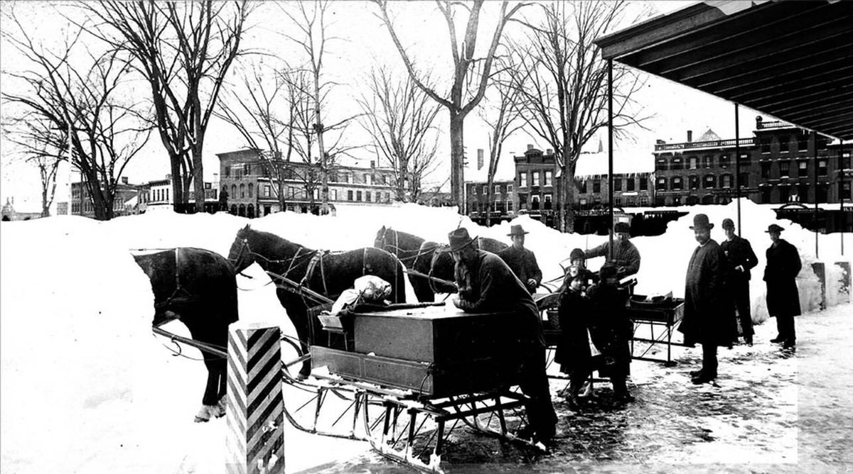 Wilbur's Market teams in Keene, New Hampshire after the blizzard of March, 1888.