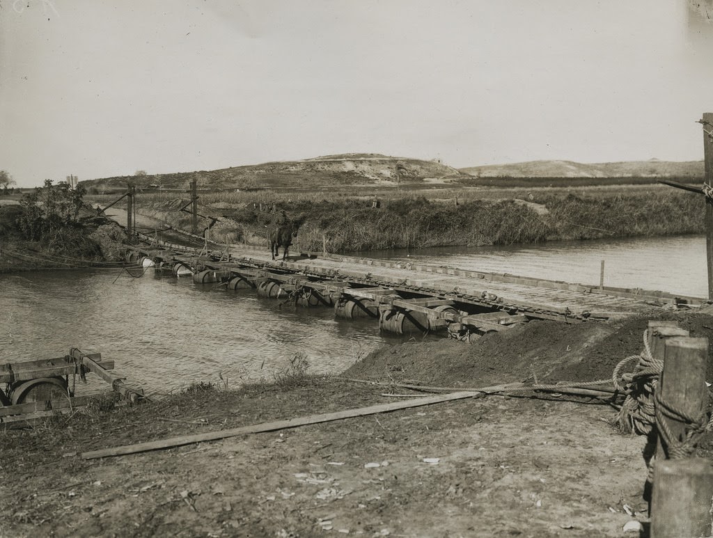 The bridge, resting on barrels, constructed by British troops, 1914.