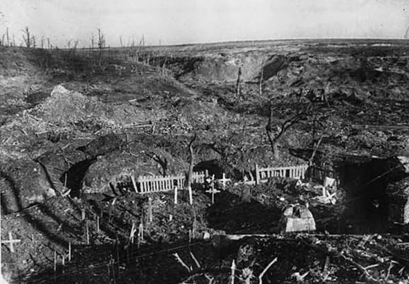 A German graveyard at Beaumont-Hamel, France, with makeshift wooden crosses marking the graves.
