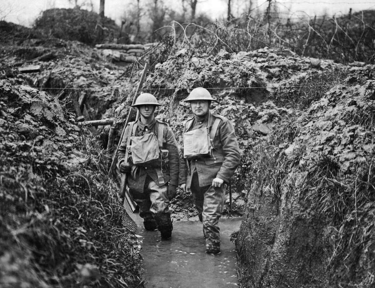 Two soldiers in a flooded trench on the Western Front, 1917
