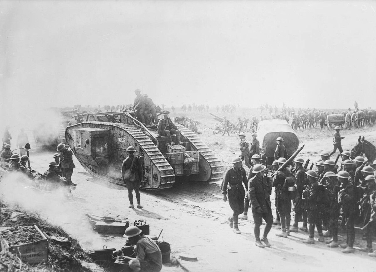 British troops and a Mark V tank advancing on Bapaume, France, 1918