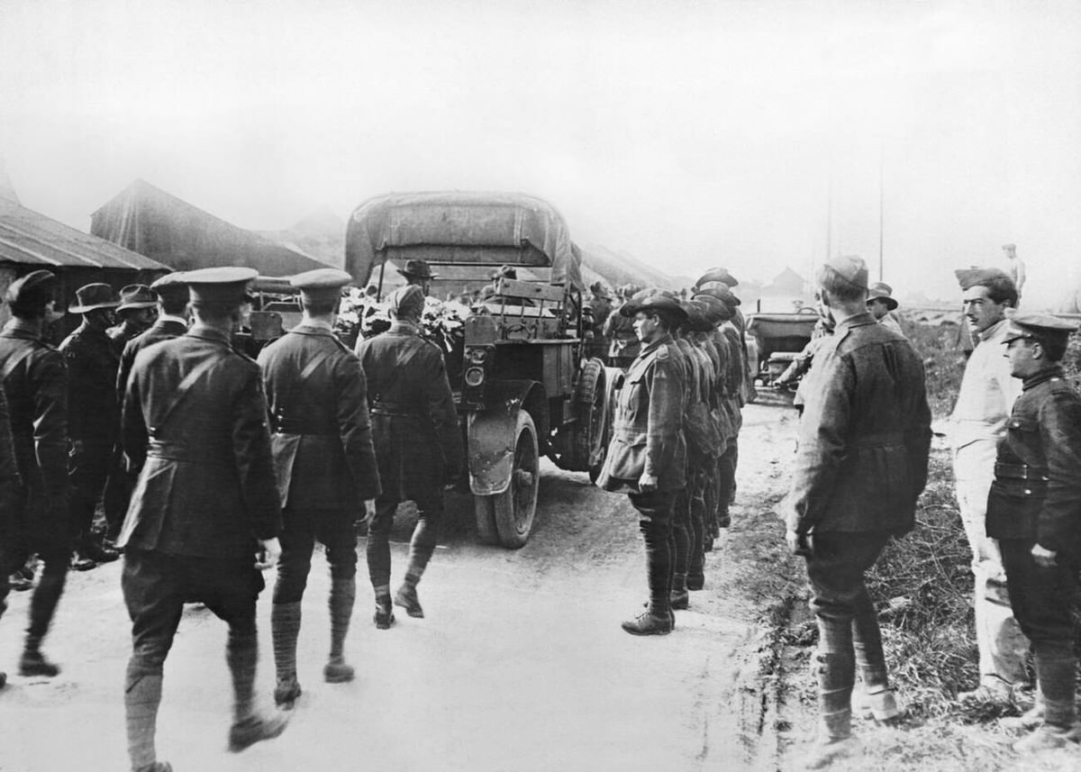 British flying officers following the funeral procession for Manfred von Richthofen in Amiens, France, 1918