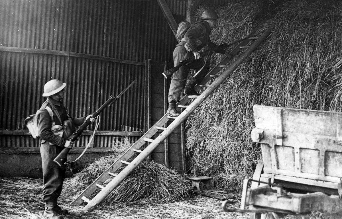 British soldiers searching a barn during an exercise in France, 1940