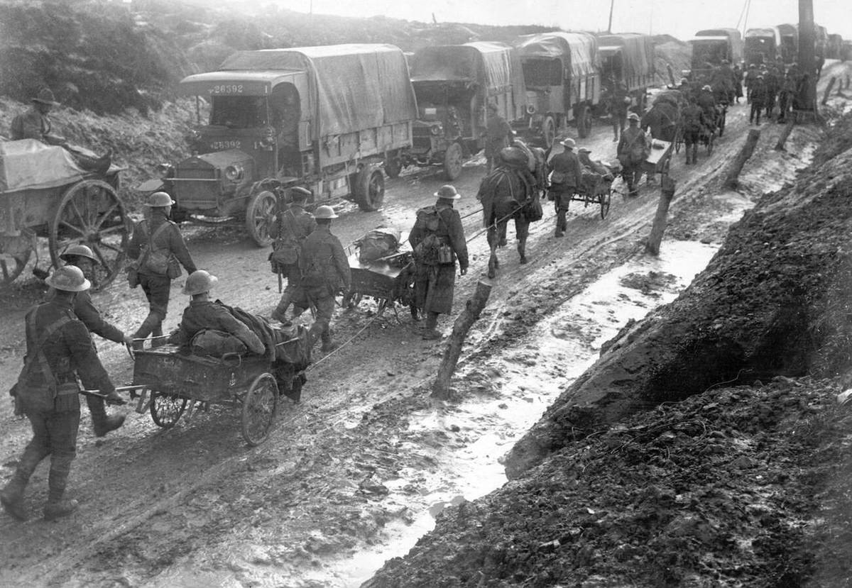 Members of the Middlesex Regiment returning from the trenches in the rain during the Somme campaign, 1916