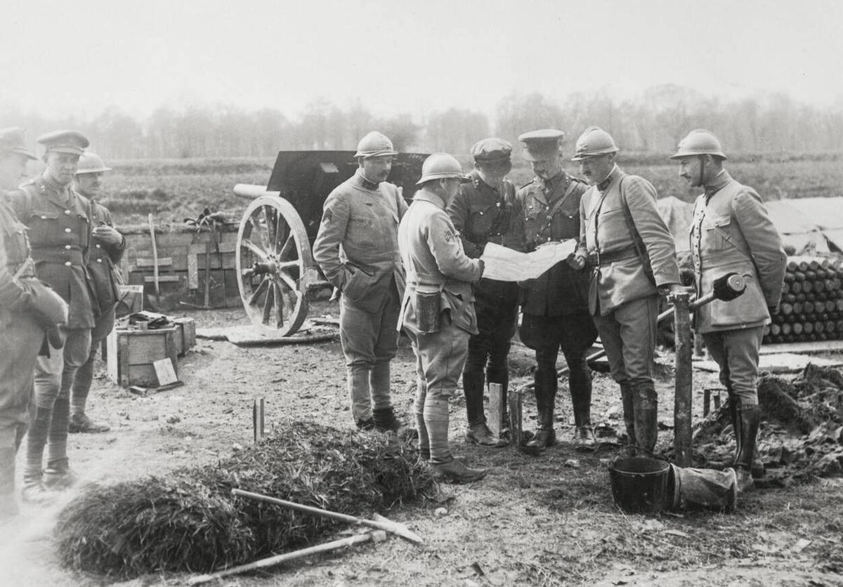British and French men looking at a map in France, 1914