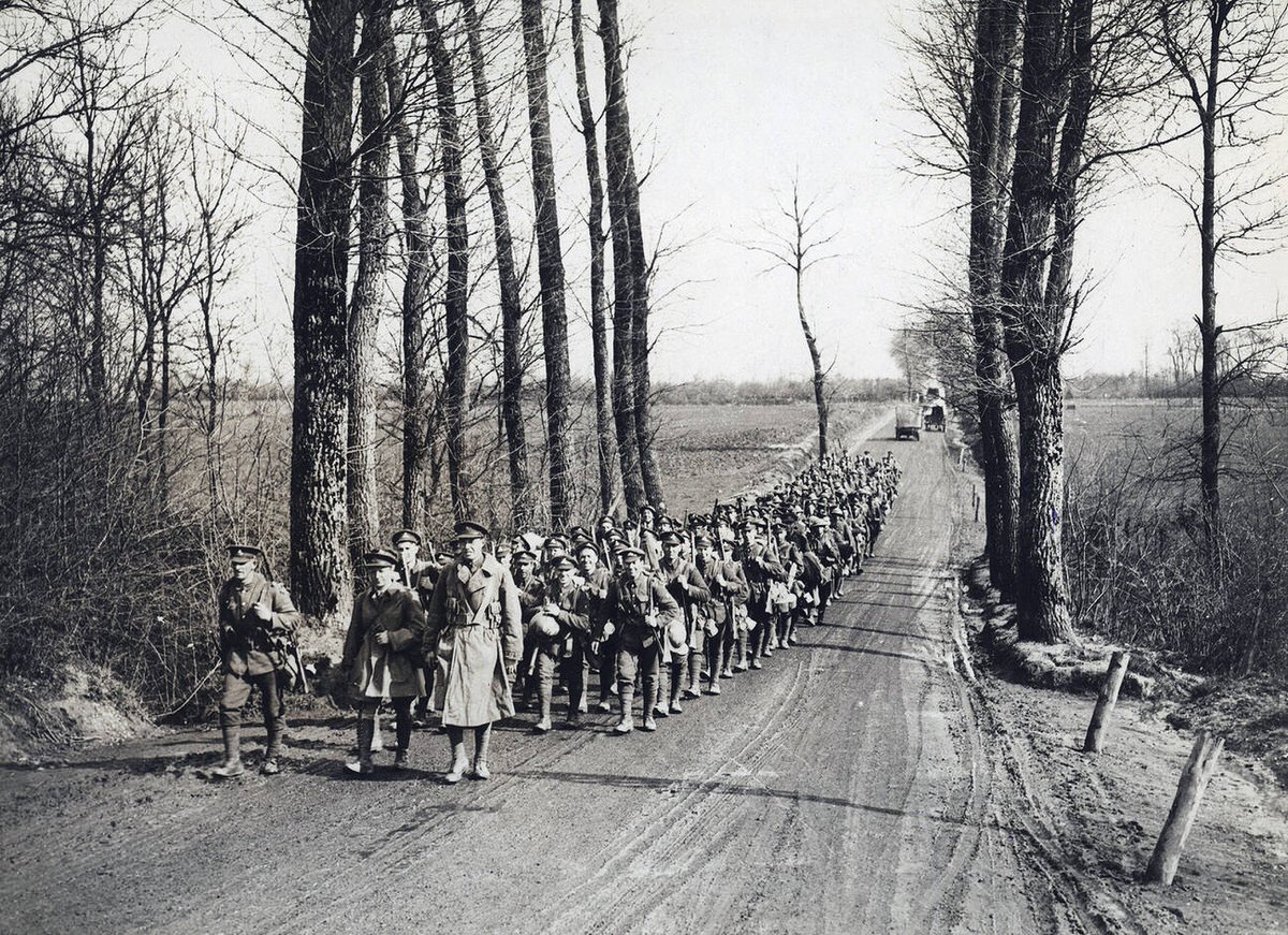 Battalion of the Royal Warwickshire Regiment going back for a rest on the British Western Front, 1914