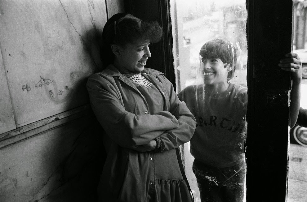 Thirteen-year-old Martin flirts with a girl. Decatur Avenue, 1982.